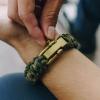 image:imageHero Company Camo Paracord Bracelet  Tactical Survival Bracelet for Men with Bronze USA Flag  Helps Pair Military Veterans with a Companion DogDesert Camo