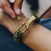 image:imageHero Company Camo Paracord Bracelet  Tactical Survival Bracelet for Men with Bronze USA Flag  Helps Pair Military Veterans with a Companion DogDesert Camo